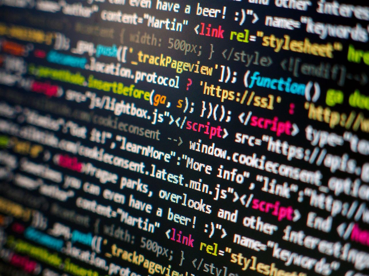 Production source code with syntax highlighting on a developer screen